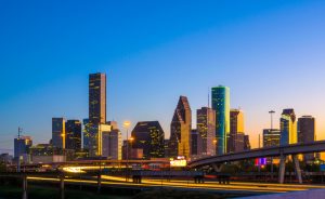 Downtown Houston Skyline at Sunset with Orange Reflection